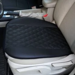 Faux Leather Seat Cushion Pad W/ Front Pocket - Front Set Black(Faux Leather Seat Cushion Pad W Front Pocket Front Set Black) -FH Group PU211102 black in car seat
